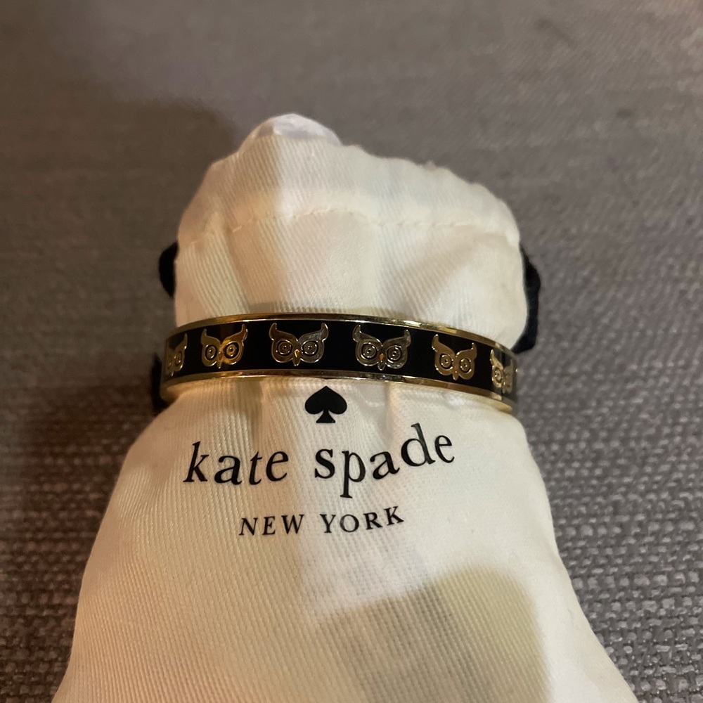 Kate Spade black enamel and gold bangle bracelet